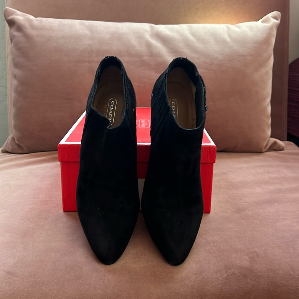 Coach Dovelyn bootie in black suede with Tortoise heel and back silver c detail.